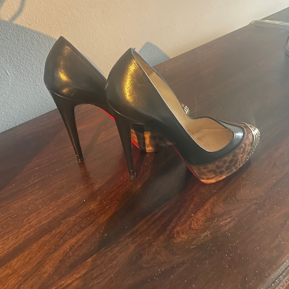 Christian Loubitan platform blk leather with leopard print nail head toe